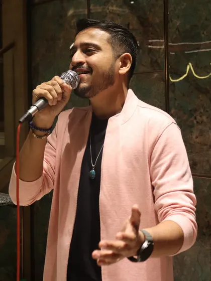 A candid moment of singing, feeling every word of the song. This is me in my natural element.