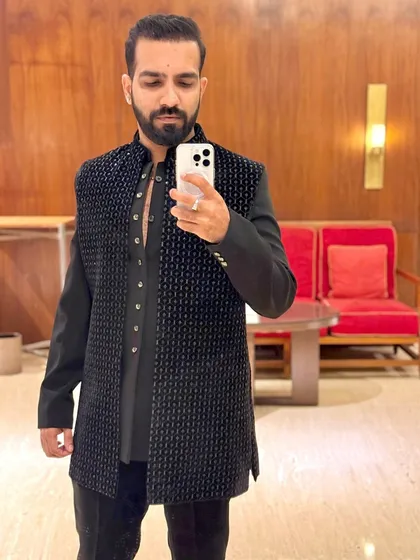 Rocking a traditional look for a wedding in Delhi. I believe in matching my style to the event's vibe, whether it's with my outfit or my music.
