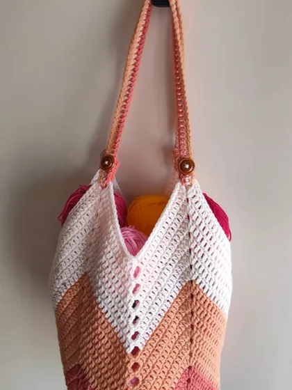 Another view of the chevron bag, showing how the straps are attached with simple wooden buttons. It's these little details that give a handmade item its unique charm.