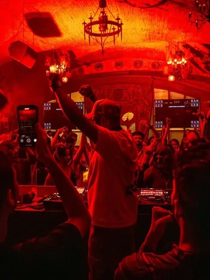 The raw power of a techno crowd in a red-lit room. This is the peak of intensity, a moment of collective release at Banger Indore.