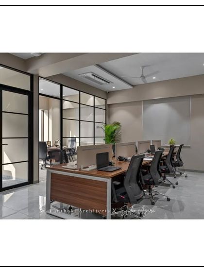 We used glass partitions to create private offices and meeting rooms without sacrificing natural light or a sense of openness. This approach fosters transparency while still providing necessary acoustic privacy.
