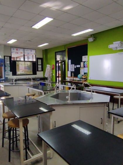 Another view of the labs before renovation, showing how incremental, unplanned additions created a cluttered and inefficient teaching environment.