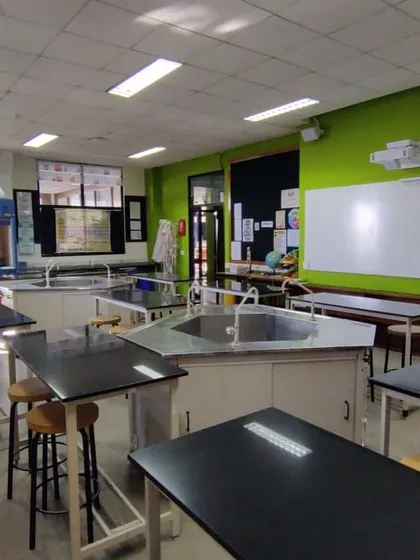 Another view of the labs before renovation, showing how incremental, unplanned additions created a cluttered and inefficient teaching environment.