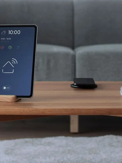 Total home control is simplified and centralized onto a single tablet interface, as seen here in a living room setting. I design these systems so you can manage your security, lighting, and other smart devices effortlessly from one place.