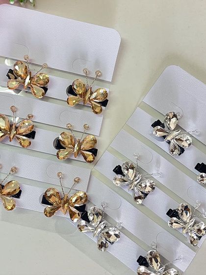 Whether you prefer silver or gold, these stone butterfly clips are a beautiful way to accessorize your hair for any occasion.