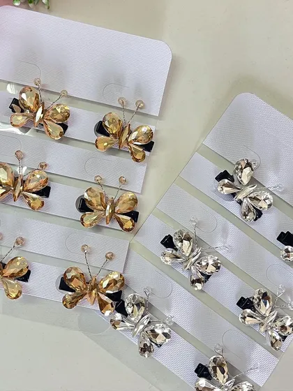 Whether you prefer silver or gold, these stone butterfly clips are a beautiful way to accessorize your hair for any occasion.