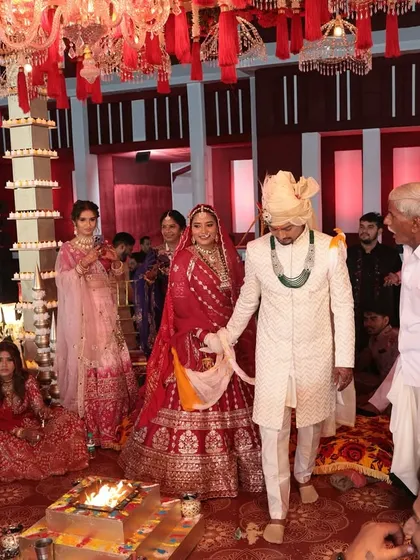 The sacred pheras around the holy fire. Our planning ensures that every traditional ritual is conducted beautifully, with all the focus on the couple's vows.