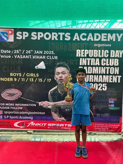 The U11 boys' runner-up, Sarthak Kulkarni, with his medal and trophy.