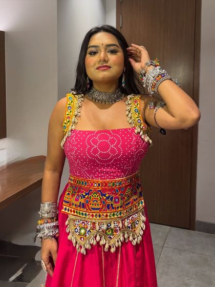 Feeling the Navratri spirit in this vibrant ensemble. As a host, dressing the part helps me connect with the audience and the theme of the event.