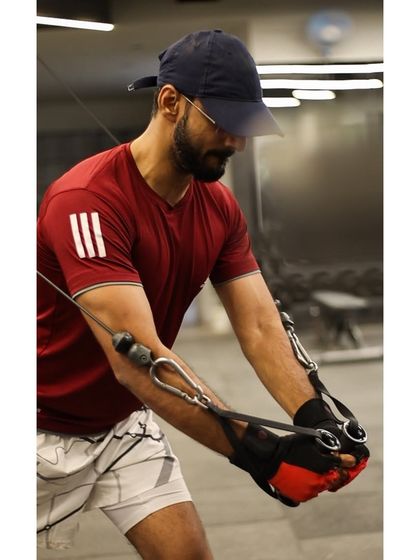 The cable fly is a great finishing exercise for the chest. This member is using D-handles to get a deep stretch and contraction of the pectoral muscles.