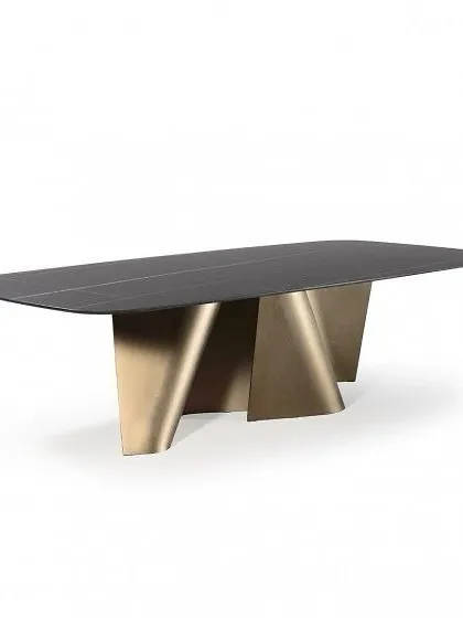 This design showcases a dining table with a bent and flowing PVD rustic gold base. The unique, angular form of the base provides a sculptural quality that adds elegance to any dining space.