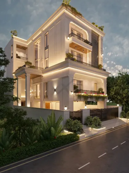 Another angle of the neoclassical residence, showcasing how the warm lighting washes over the soft beige exterior at night. The illumination highlights cornices, arches, and vertical lines, casting a welcoming glow.