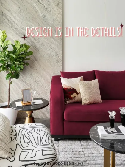 Design is in the details. A bold red sofa, a patterned armchair, and carefully selected cushions come together to create a living space that is full of life and personality.