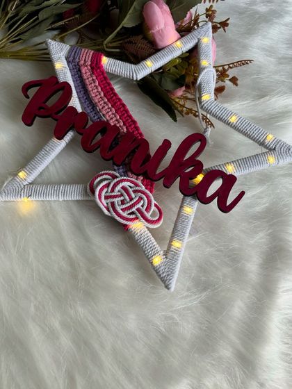 Another angle of the lighted "Pranika" star hanging, showing how it can be a beautiful piece of decor from any view.