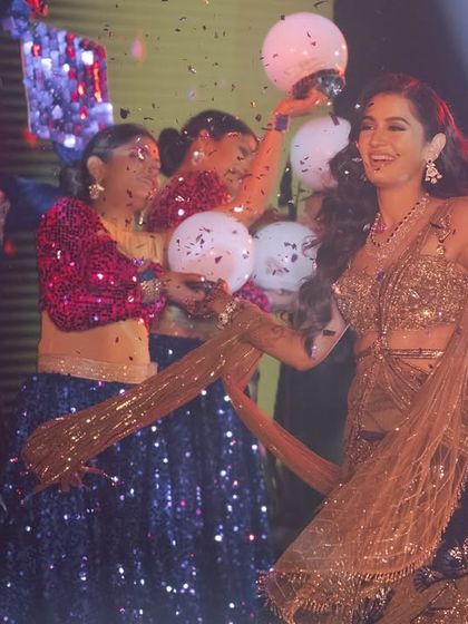 A fun, energetic moment from a group performance. We used balloon props and confetti to add a celebratory and playful element to the dance.