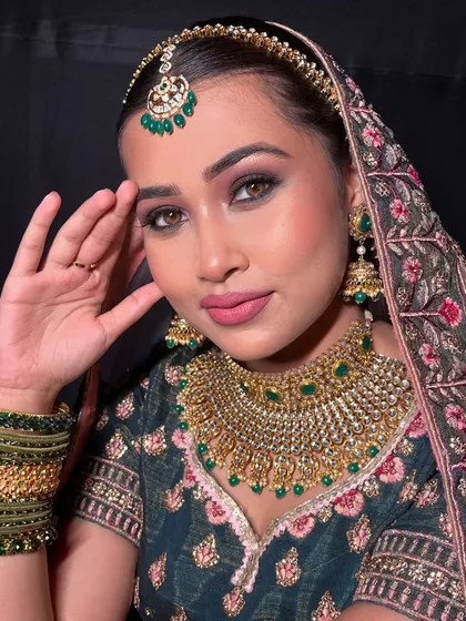A beautiful pose showing the complete look, including the elegant dupatta setting.