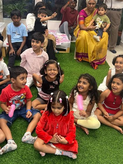 A room full of happy, smiling faces after a birthday party show. Their expressions of joy are the best review I could ever ask for.