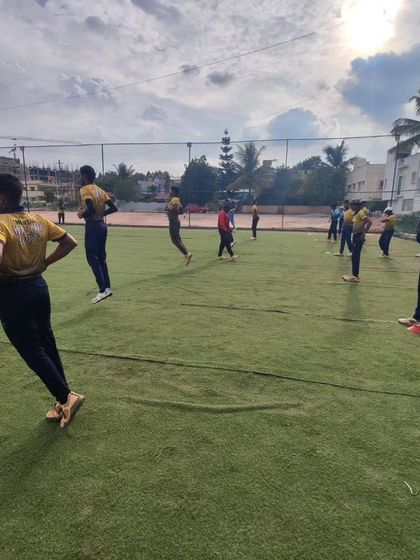 Players doing running drills to improve their stamina and speed. A good fitness base is essential for lasting through a long match.