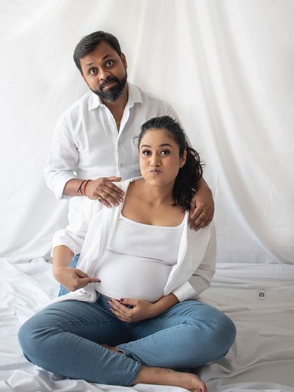 A fun and playful couple's portrait from a casual session. These lighthearted moments are just as important to capture.