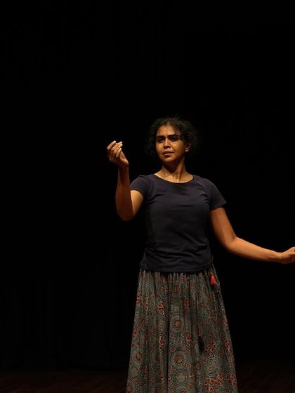 A dancer in a moment of expression during a tech run.