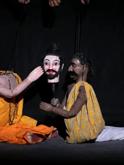 A complex scene from the Sri Lankan performance involving multiple marionettes. This highlights the storytelling capabilities of traditional string puppetry.