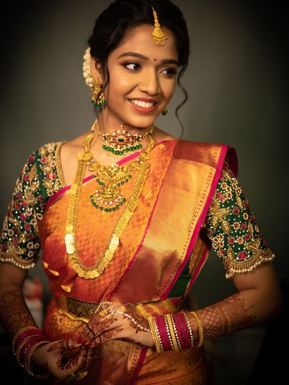 Professional shots of my bride Keshika. Her traditional Telugu bride look featured glowing skin, defined eyes, and a lip color that perfectly matched her saree.
