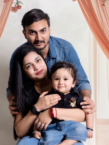 A classic studio family portrait that brings everyone together. I always make time during my kids' photoshoots to include parents, ensuring you get a beautiful, professionally edited photograph of the whole family.