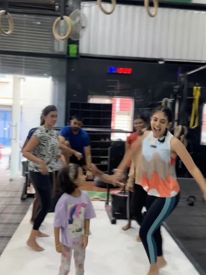 A typical scene when the coaches take a day off. The members and their kids turn the gym into a dance floor.