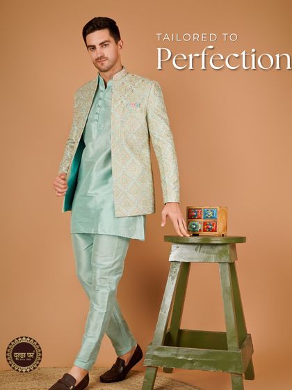 Tailored to perfection. A model in a mint green Indo-Western outfit, looking sharp and elegant.