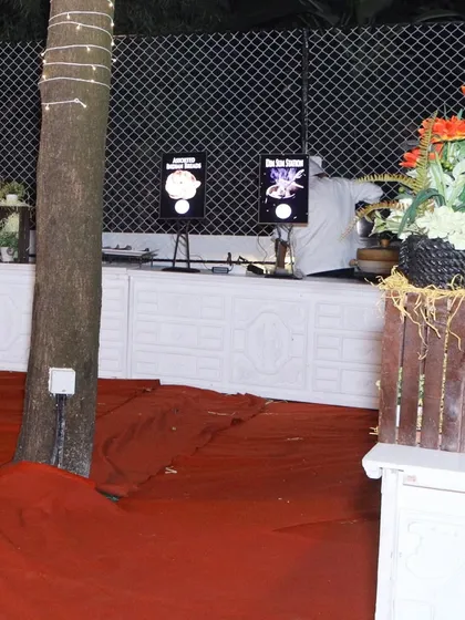 An outdoor catering setup with digital menu boards for a clear and modern presentation. This ensures guests know exactly what delicious options are available.