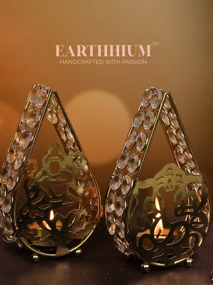 Illuminate your Diwali with these stunning Laxmi and Ganpati tea-light holders from my crystal collection. They add a divine touch and are available individually or as a set.