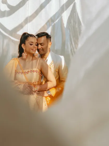An intimate embrace, with soft, dreamy lighting creating a romantic and ethereal mood.