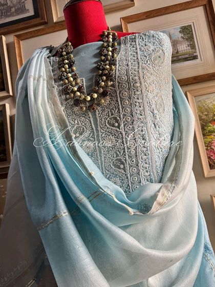 A draped view of the suit, highlighting the beautiful gradient of the ombré dyed dupatta.
