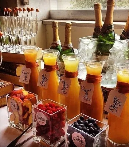 Add a touch of sparkle to your next celebration with our Bubbly Bar. We provide a selection of juices and fresh fruit garnishes like peach, raspberry, and blueberry for guests to create their own custom drinks.