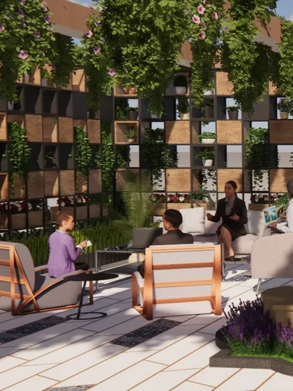 A comfortable outdoor living room setup, complete with sofas, armchairs, and a coffee table. The space is defined by a vertical garden screen, offering privacy and a lush backdrop for socializing.