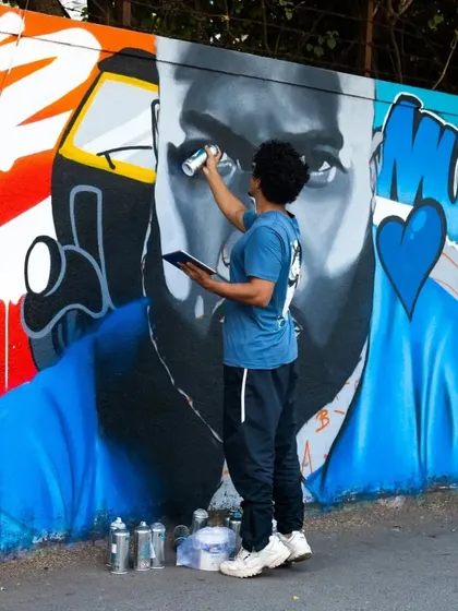 Here you can see artist Mooz at work on the Pollard mural. These projects are a testament to the incredible skill of spray can artists in our community.