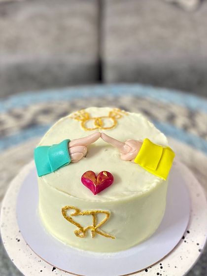 The clean and simple design of our engagement cake.