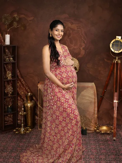 Completing this beautiful series, every image tells a story of grace and tradition. This ethnic-themed maternity shoot is rich in culture and elegance.