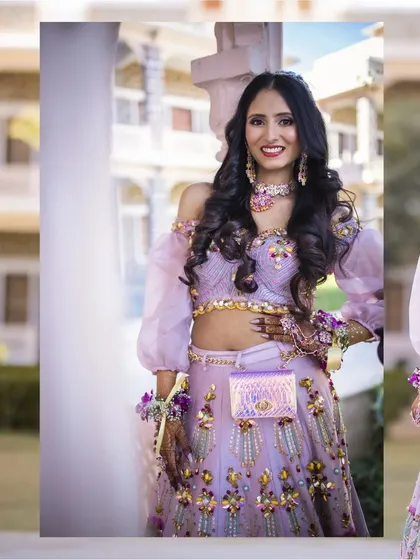 A bright and happy portrait of the bride at her Mehendi. Her beautiful smile and colorful outfit radiate pure joy.