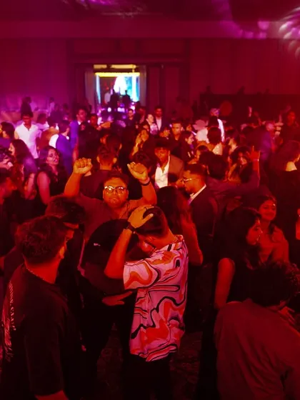 The view from my console during a high-energy corporate party. A packed dance floor under the lights is the goal for every event I play. Pure mayhem.