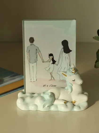 The unicorn photo frame, a perfect blend of whimsy and sweetness. Its gentle design and soft colors make it an ideal frame for capturing the innocence of childhood.