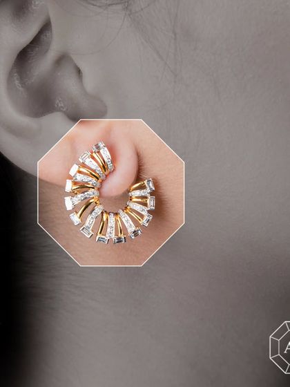 Elevate your style with our versatile 18k gold ear clips. The spiral design is set with baguette and round diamonds, crafted to complement both Indian and Western outfits with a touch of modern luxury.