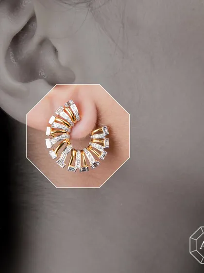Elevate your style with our versatile 18k gold ear clips. The spiral design is set with baguette and round diamonds, crafted to complement both Indian and Western outfits with a touch of modern luxury.
