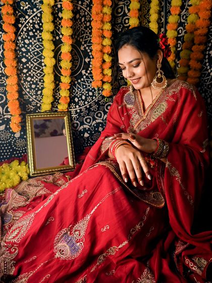 Another shot of the client in her mother's 35-year-old wedding attire, paired with my timeless 'मणिकर्णिका' (Manikarnika) earrings.