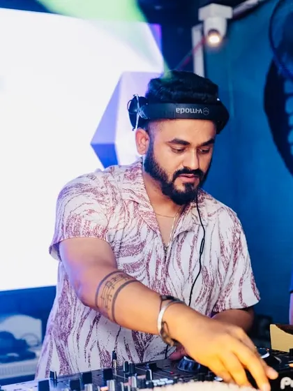 In the zone during a Neon Theme Party in Bengaluru. A great DJ set is about reading the room and crafting the perfect musical journey, one track at a time.
