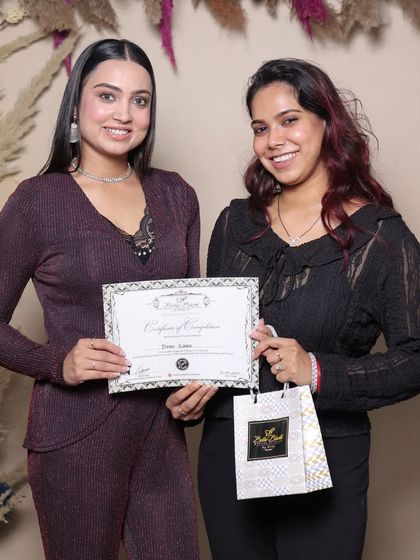 Another happy student on her graduation day. The certificate is proof of her hard work and dedication.