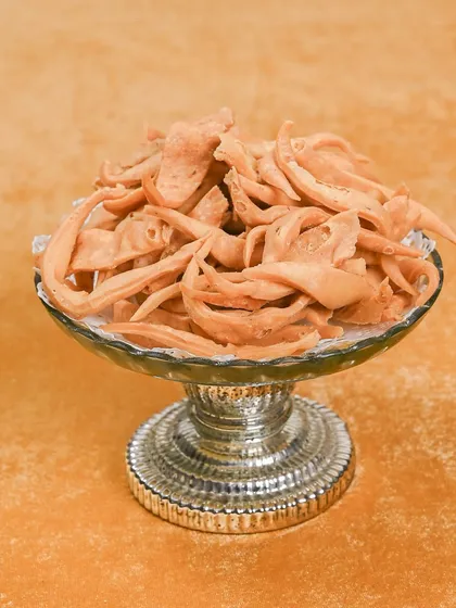 This is another variety of my wedding savories, a flaky, flavorful creation that is part of my bhaji packs. Every treat is an expression of love, nostalgia, and elegance.