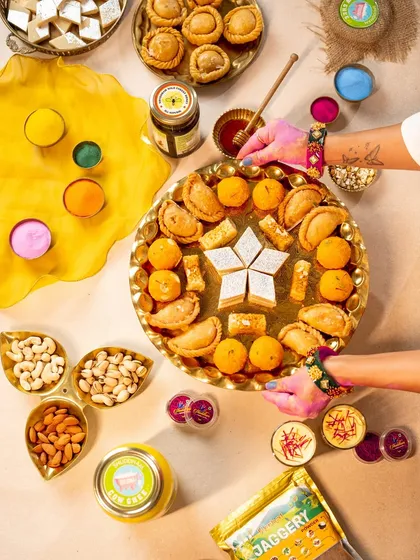 A huge part of food videography is styling. Here is a vibrant flat lay for a Holi festival shoot, where we used color, texture, and traditional sweets to create a festive mood.