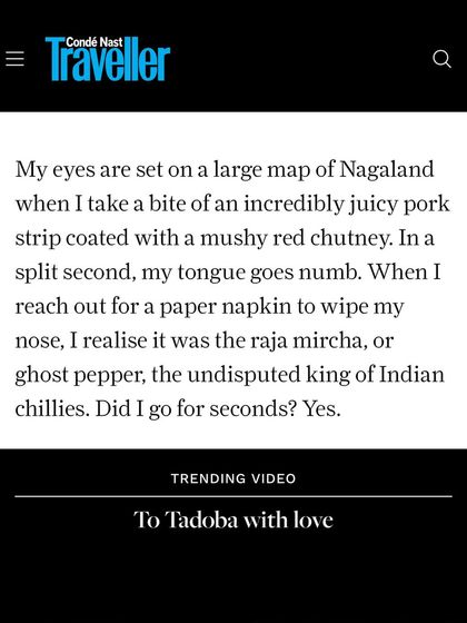 A quote from the Condé Nast Traveller review describing the experience of eating our juicy pork with red chutney and the fiery kick of Raja Mircha.