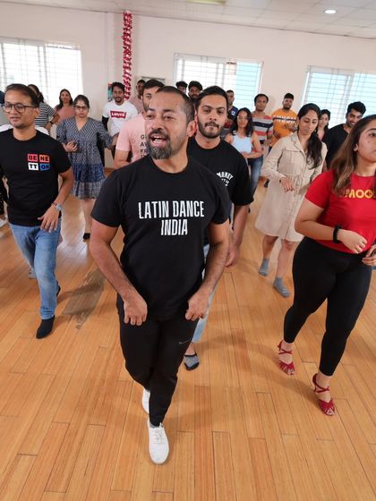 Sai leading a group of enthusiastic students. The energy in our beginner classes is always high, with everyone excited to learn and support each other.